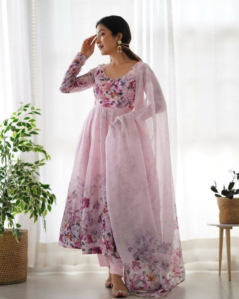 Elegant pink organza kurta set with intricate sequin embroidery and matching cotton bottom.