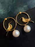 Elegant white pearl stud earrings with a gold-tone top, 4.5 cm length