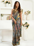 Dusty green linen ready-to-wear saree with floral and ethnic motifs and unstitched blouse.