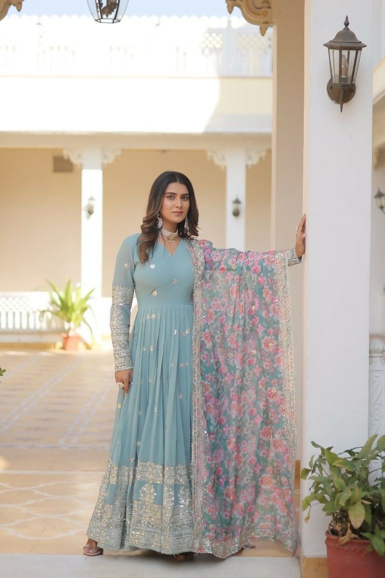 Sky Blue Faux Georgette Anarkali dress with multi-colored floral embroidery and sequin embellishments.