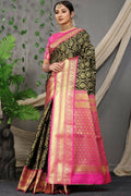 Black Kanjivaram silk saree with Zari woven work and a contrasting pink blouse