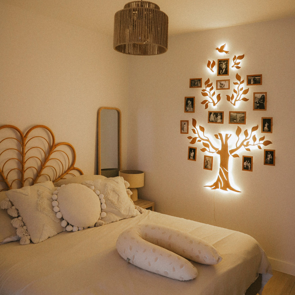 Nova Wooden LED Family Tree with warm lighting and photo display branches on a living room wall