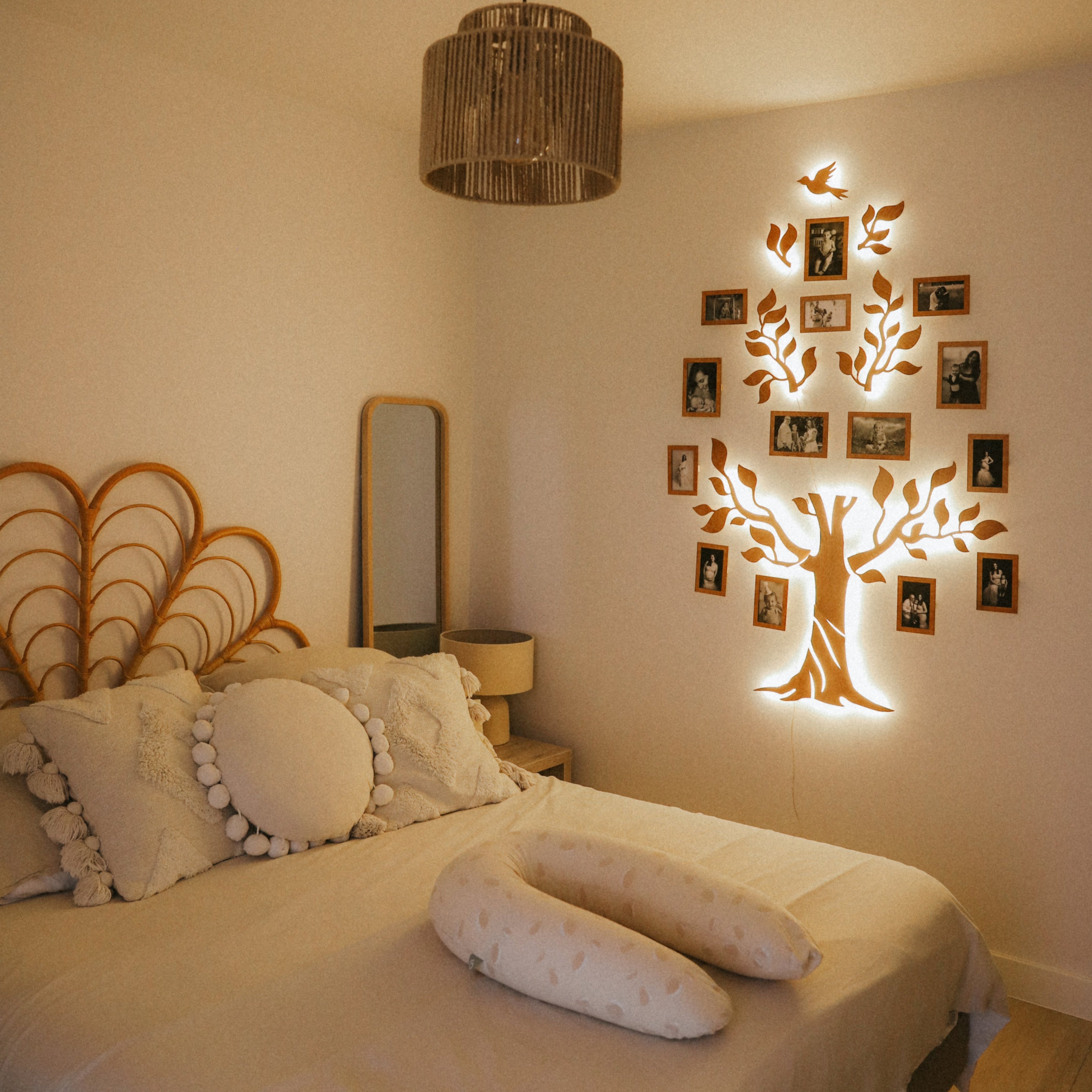 Nova Wooden LED Family Tree with warm lighting and photo display branches on a living room wall