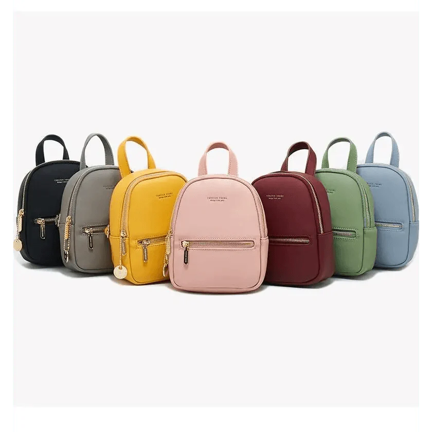 Modern mini soft-touch leather backpack for women in various solid colors.