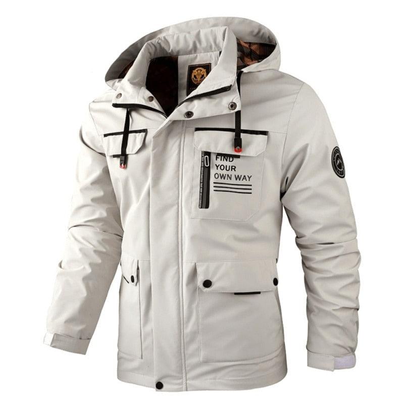 Stevvex men's waterproof windbreaker hooded jacket in an outdoor setting