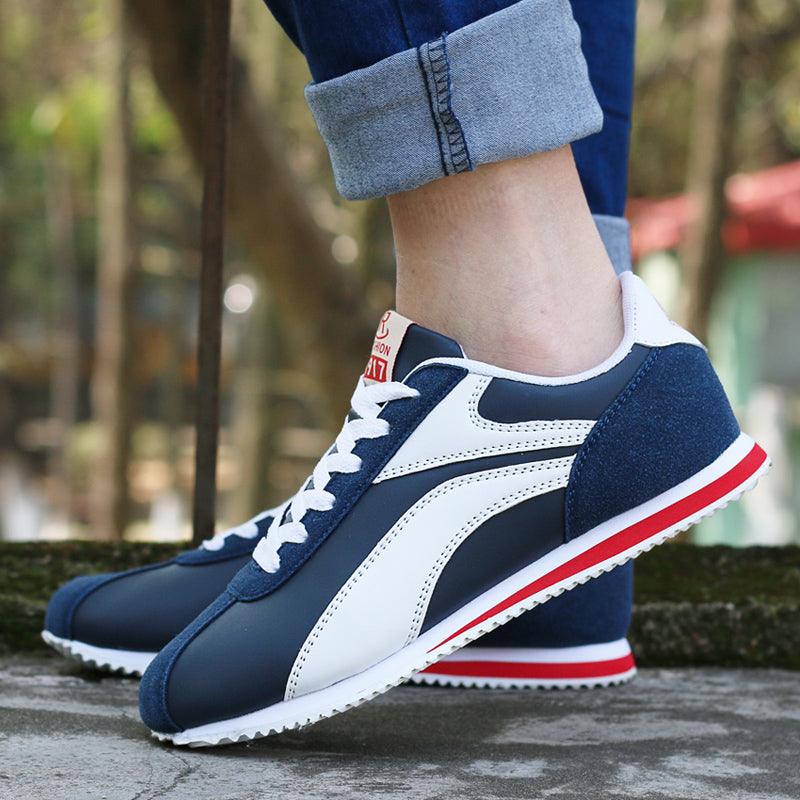 Men's blue and white breathable athletic running sneakers in a slip-on style