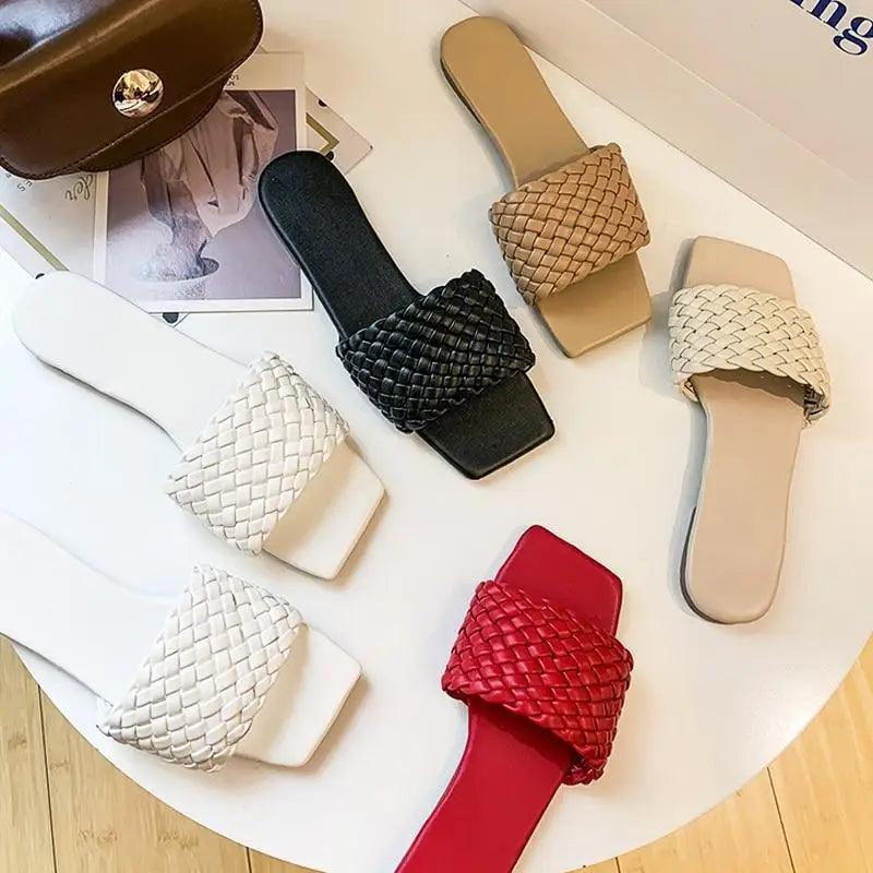 Minimalist women's braided strap flat sandals in neutral colors for beach wear