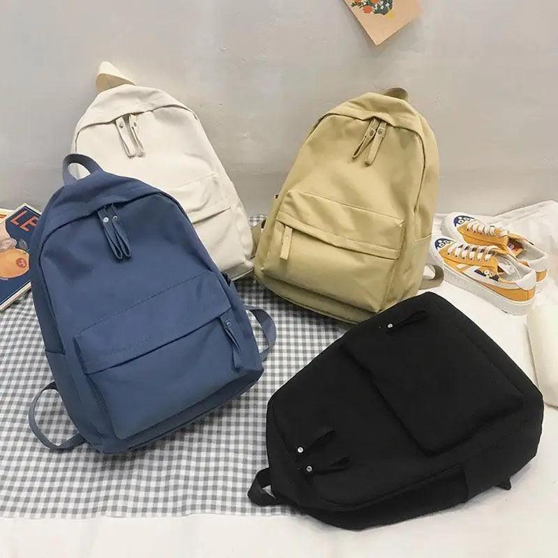 Stevvex anti-theft laptop backpack for teen girls in a solid color design