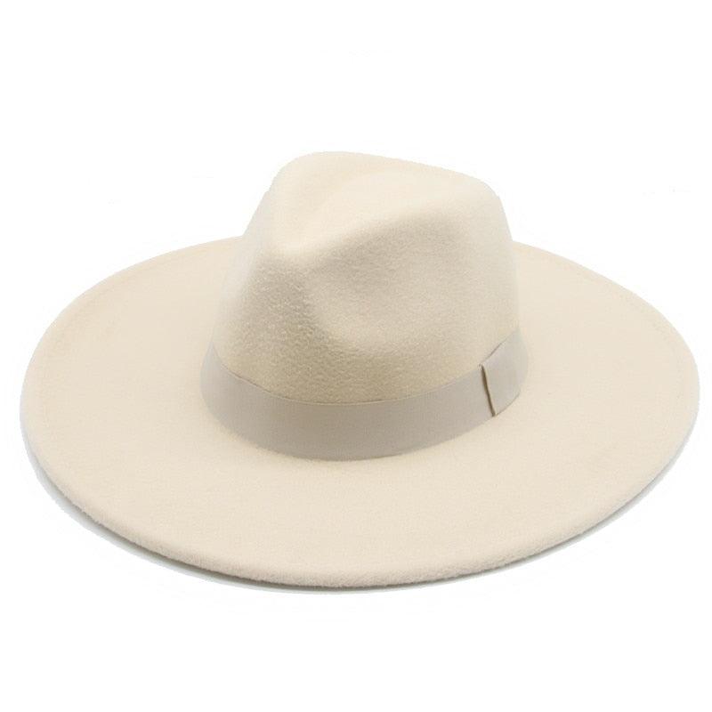 Elegant white wide brim fedora hat with a decorative band, perfect for wedding attire and retro styling.