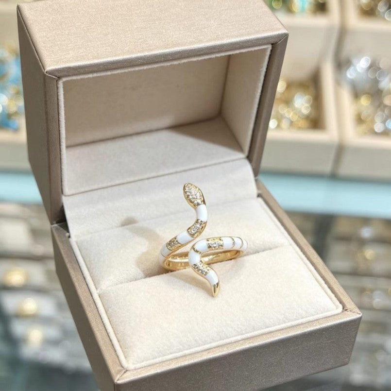 Exaggerated gold-tone snake design ring for the index finger