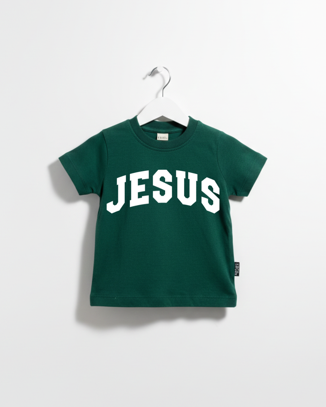Kids wearing a minimalist Jesus varsity graphic tee in black cotton