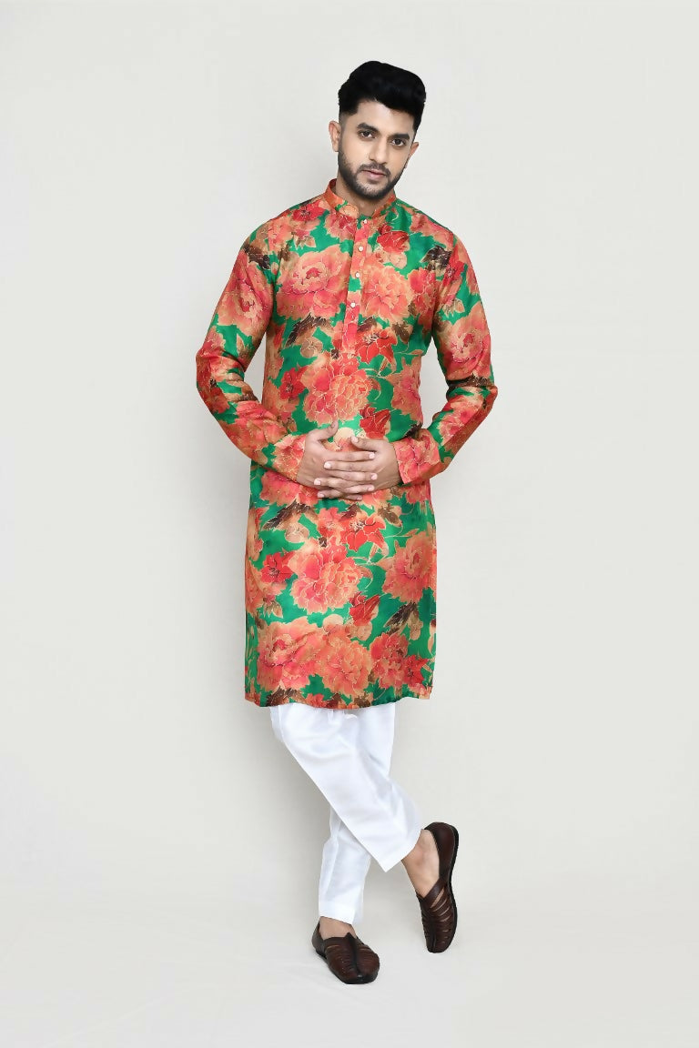 A green modal silk kurta paired with matching straight fit pants for a stylish ethnic look.
