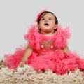Pink gown with scuba bodice, golden patch, net ghera, and frill sleeves