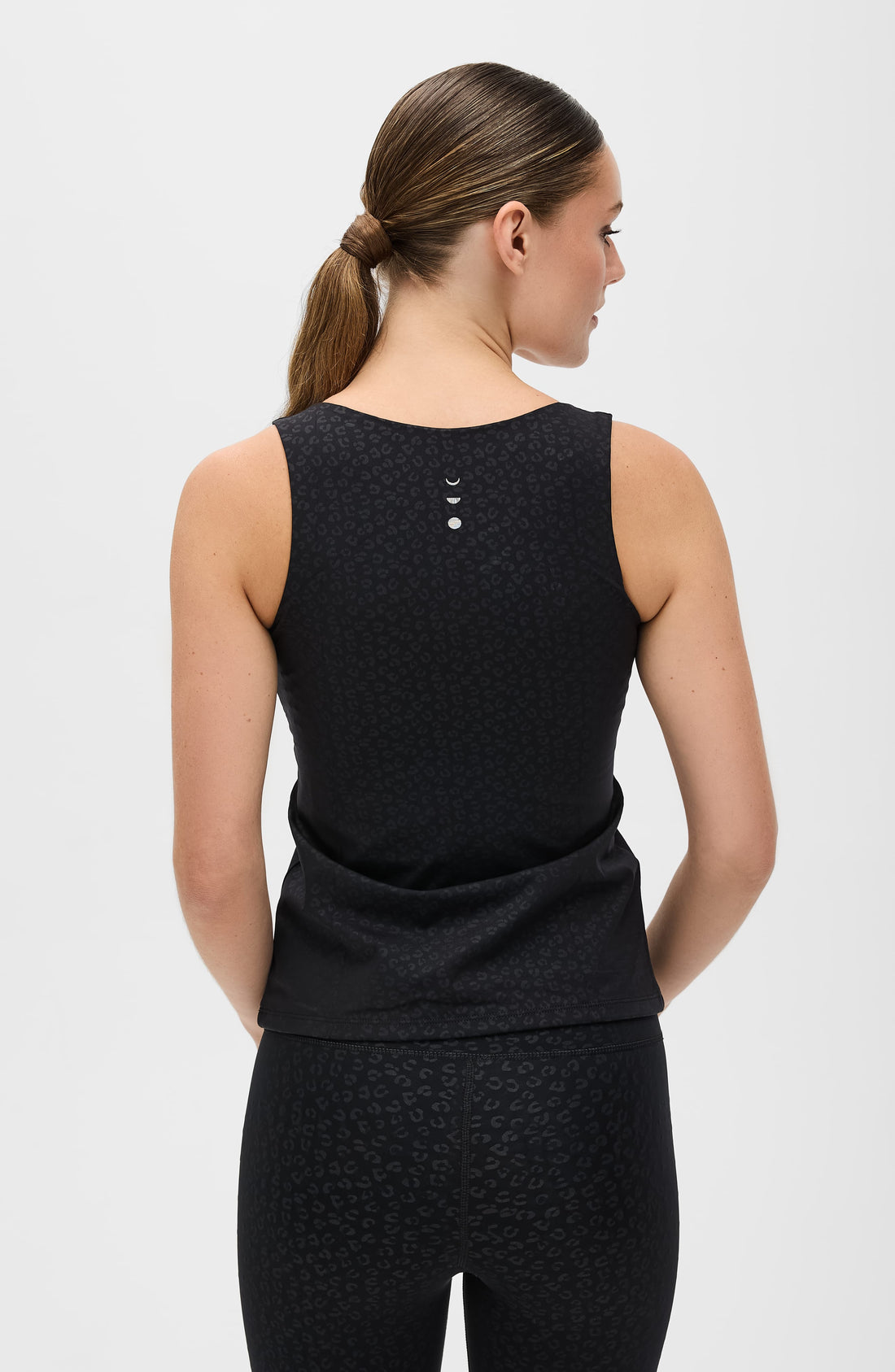 The Fierce Tank: Sculpting Women's Black Animal Print Athletic Top