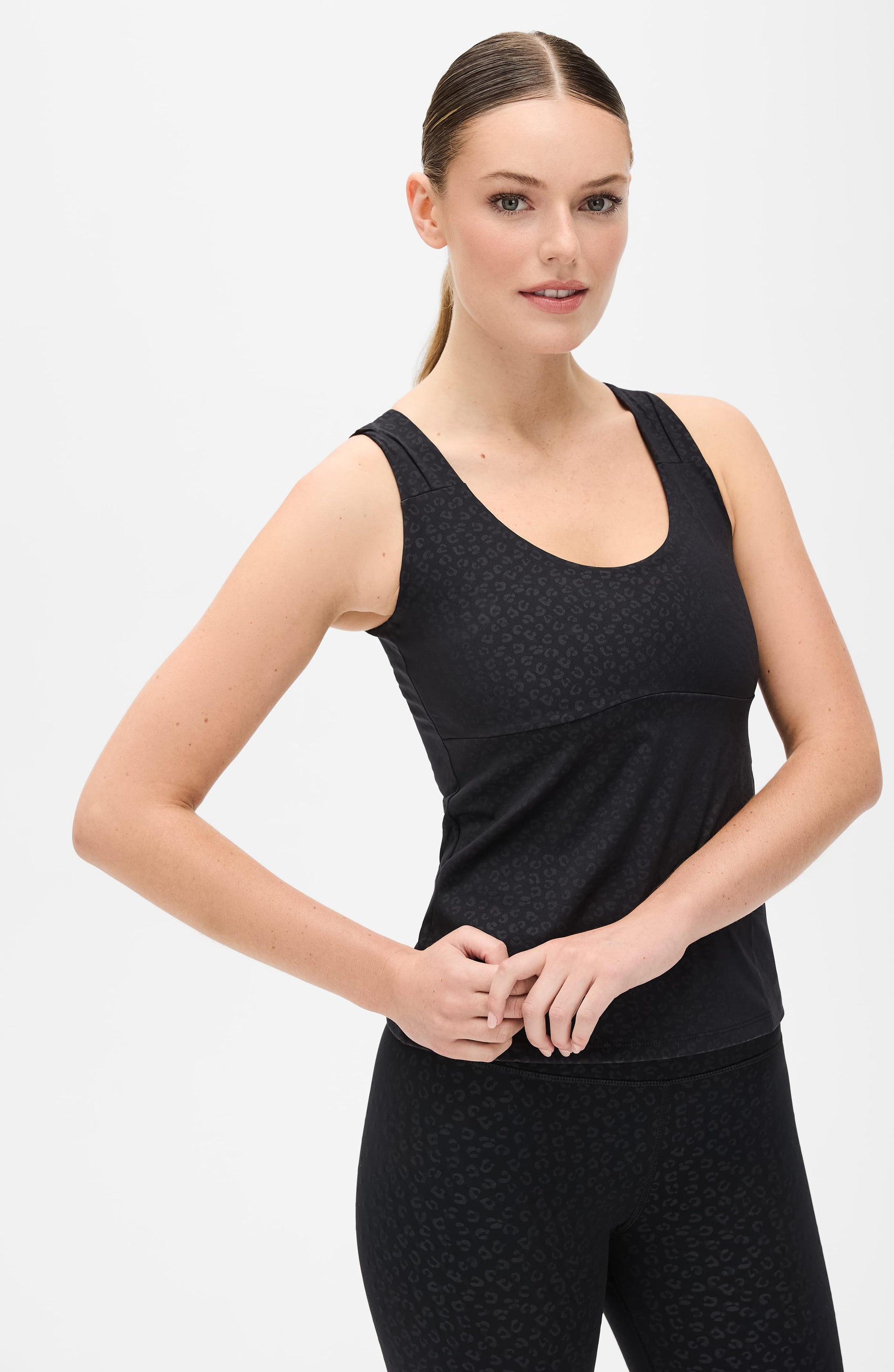 The Fierce Tank: Sculpting Women's Black Animal Print Athletic Top