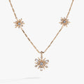 Festive Sparkle crystal starburst inline pendant necklace on an adjustable textured chain.