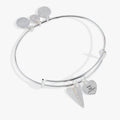First anniversary bangle featuring a paper airplane charm and a crystal-adorned Happy First Anniversary tag