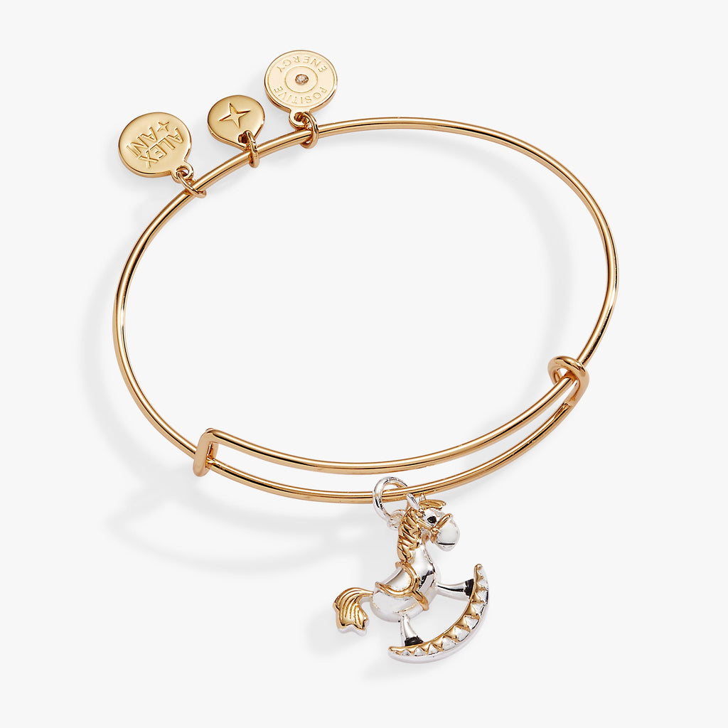 Two-tone silver and gold rocking horse charm bangle bracelet with Baby's First Birthday engraving.