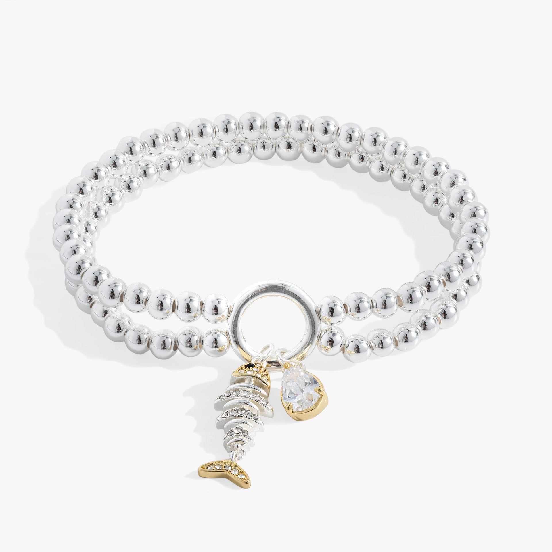 Fishbone double stretch bracelet with crystal-detailed charm and faceted teardrop bead.