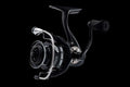 Fission Pro spinning reel in black side profile view