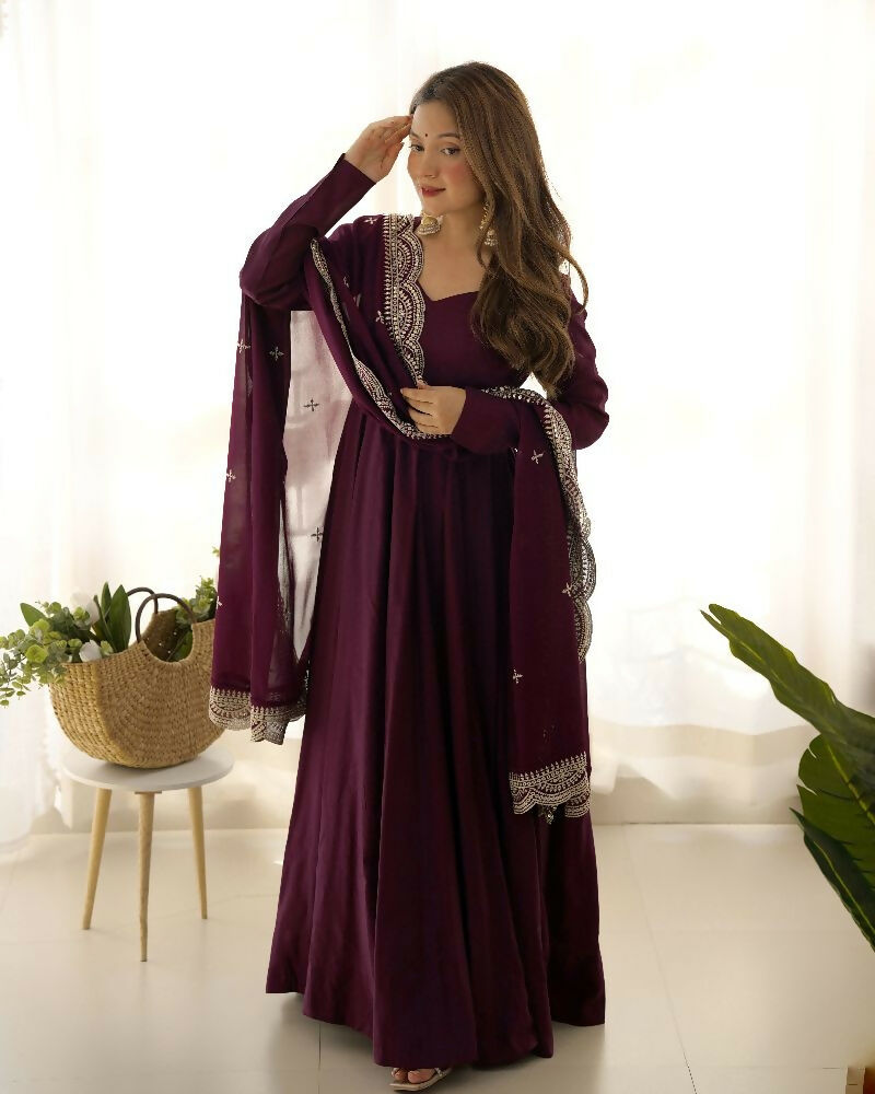 Elegant wine-colored Chanderi kurta set with intricate sequence embroidery and matching georgette dupatta