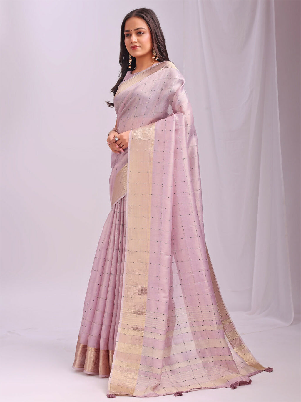 Beautiful Light Pink Organza Saree with matching blouse piece.