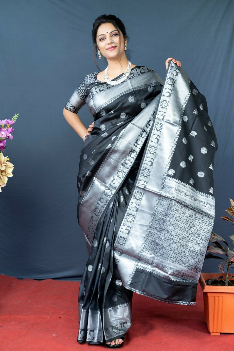 Black soft Banarasi silk saree with intricate gold Zari woven pattern and matching blouse