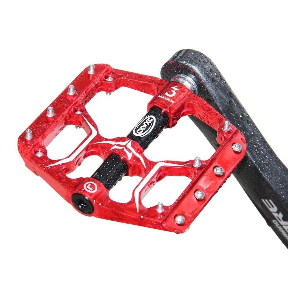 CXWXC aluminum wide platform flat bike pedals in red and black