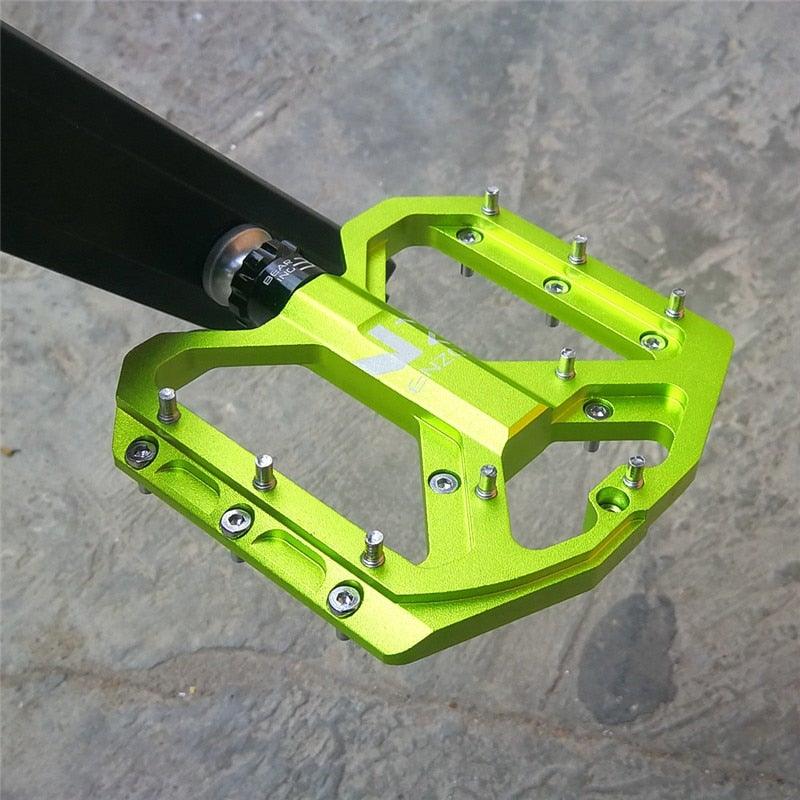 Stevvex ultralight CNC aluminum mountain bike pedals with anti-slip platform design.