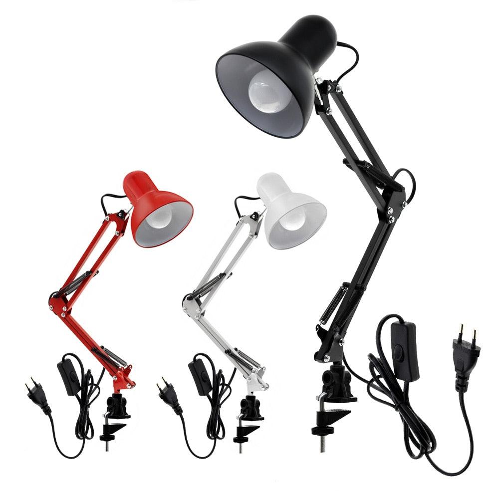 Modern black metal architect desk lamp with adjustable folding arm on a clean office desk.