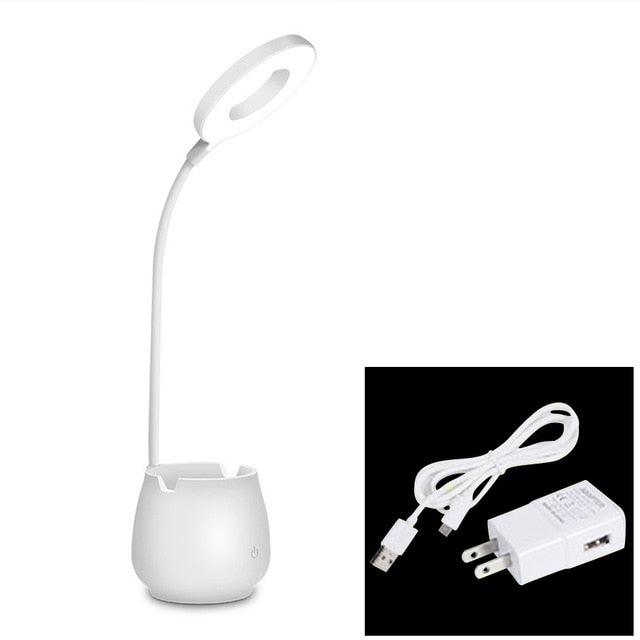 White flexible LED desk lamp with pen holder base and adjustable light settings