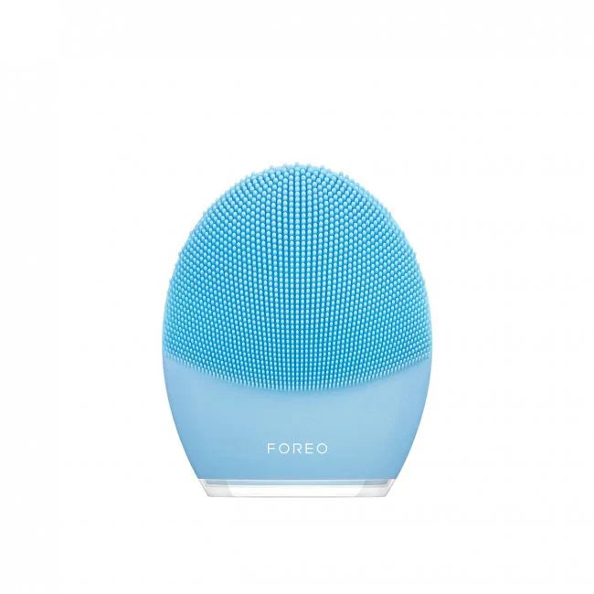 Blue Foreo LUNA 3 facial cleansing device with soft silicone bristles.