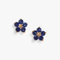 Delicate flower stud earrings with blue and clear crystal petals in a gold or silver setting