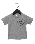 Young boy wearing a black Mama's Boy graphic t-shirt, soft cotton fit for active play.