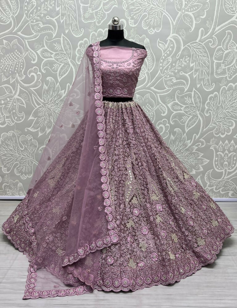 Pyazi bridal net lehenga choli with detailed hand mirror, dori, and diamond embroidery.