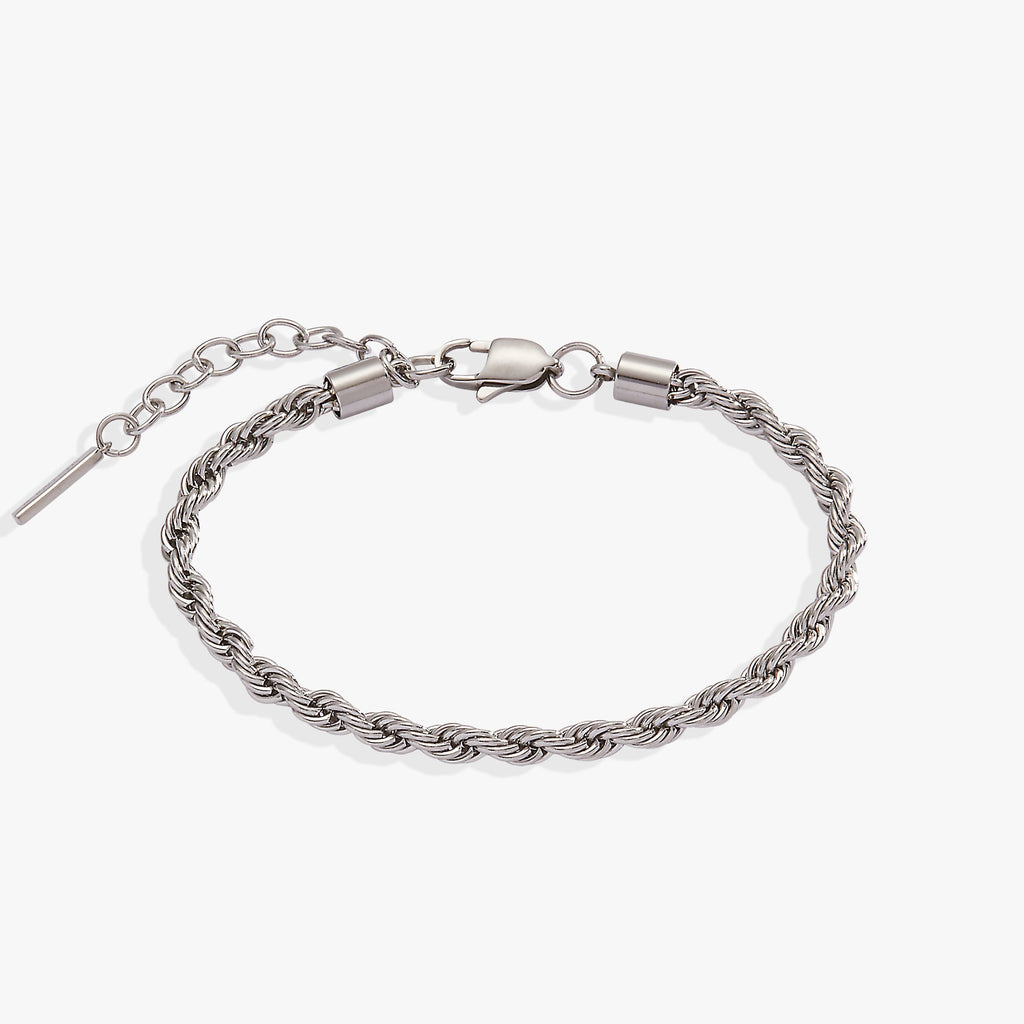 Silver stainless steel French rope chain bracelet with adjustable sliding clasp.