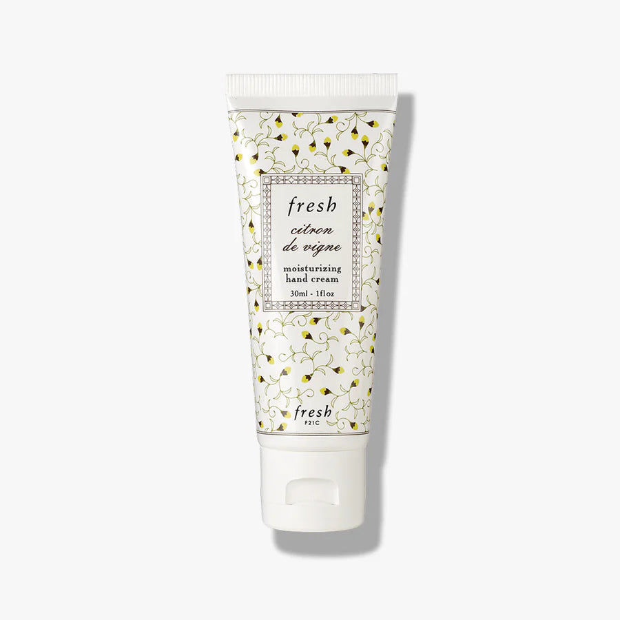 A 1 OZ tube of Fresh Citron de Vigne Moisturizing Hand Cream with citrus branding.