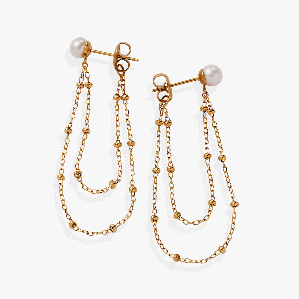 Close up of Freshwater Pearl Front-and-Back Earrings in polished gold with delicate cable chains.