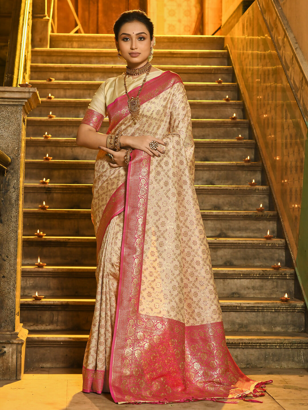 Luxurious pink Banarasi silk saree with a traditional sheen and matching blouse