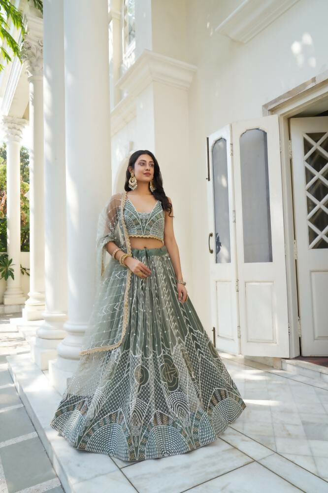 Dusty Green butterfly net lehenga choli with white thread work and sequence embroidery for wedding wear