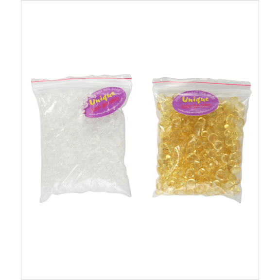 Close-up of premium keratin glue pellets used for secure hair and nail extension applications
