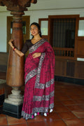 Rani pink Chanderi cotton saree with traditional Batik print patterns