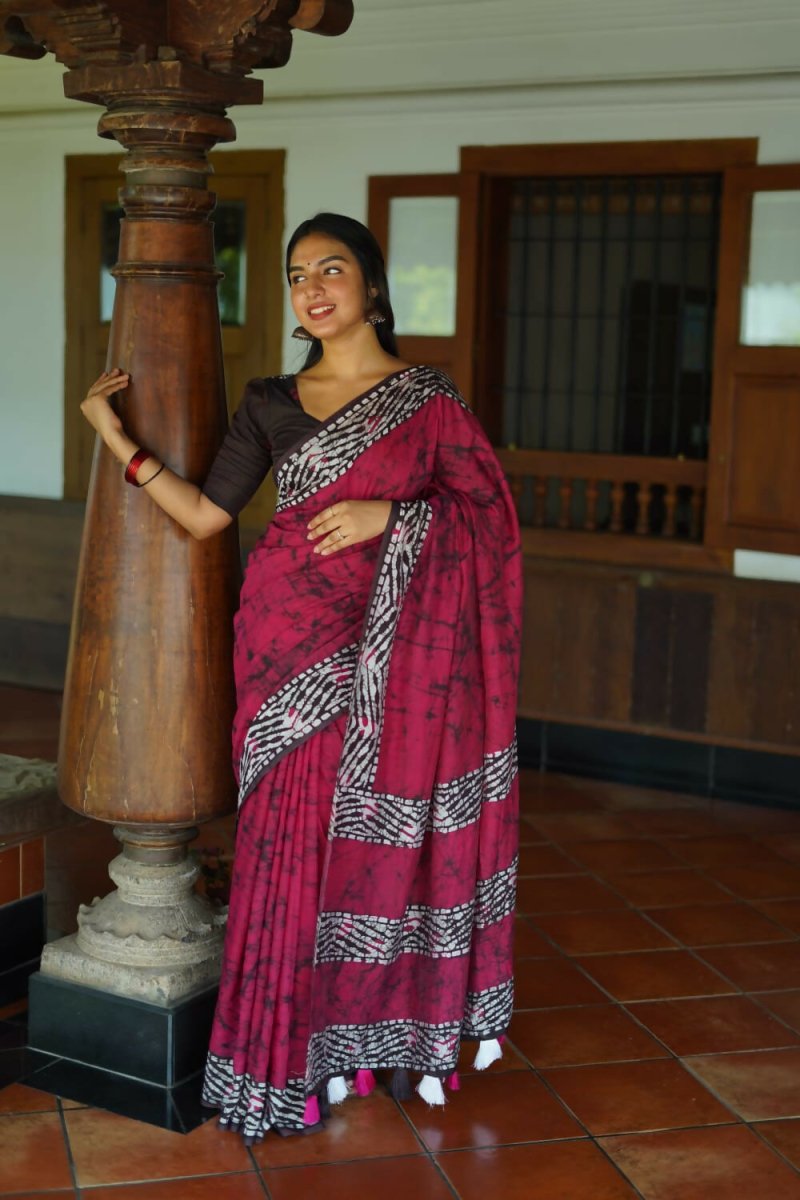 Rani pink Chanderi cotton saree with traditional Batik print patterns
