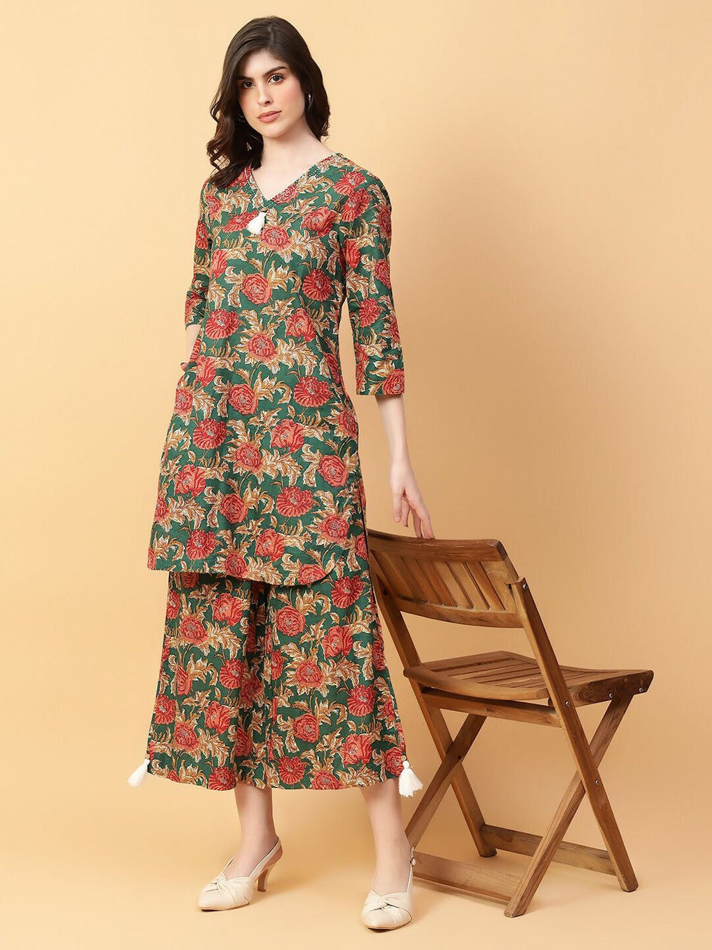 Green cotton co-ord set featuring artisan hand-work and printed design