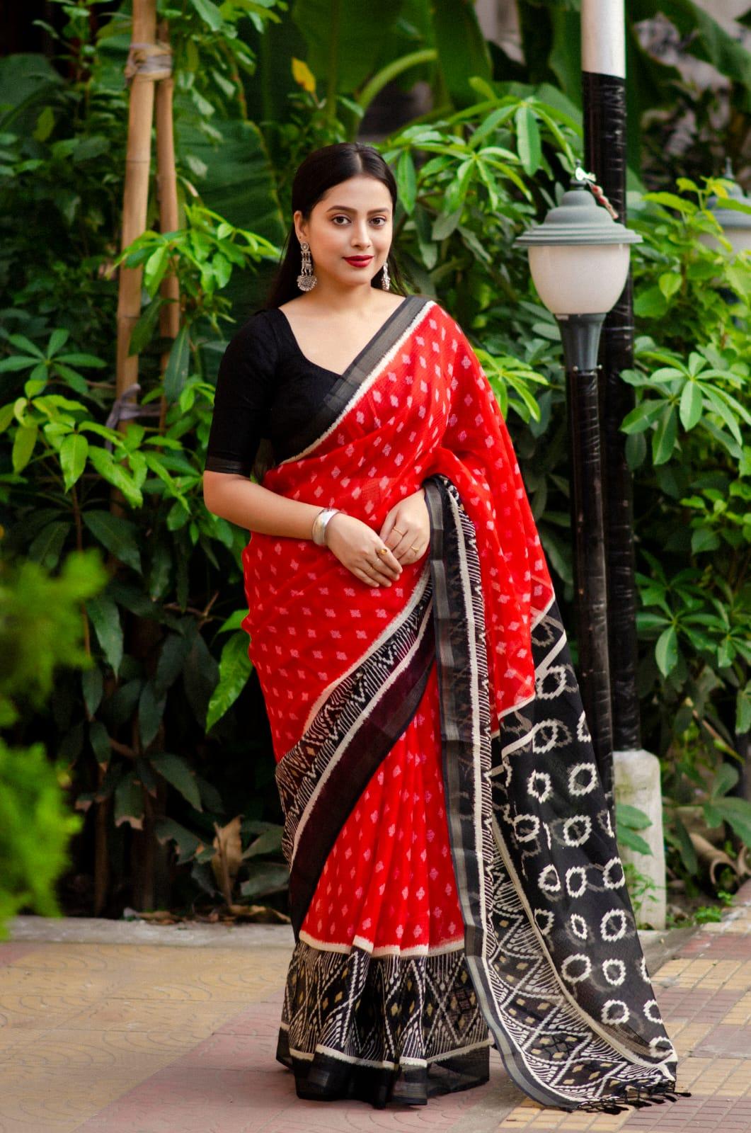 Red polycotton Ikkat print saree with zari pattu border and fancy zalar