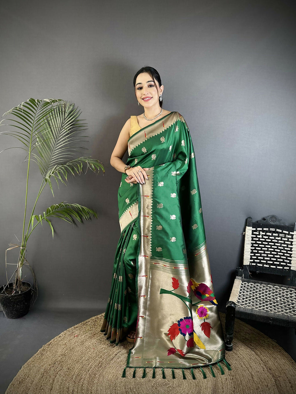 Green soft silk Kanchipuram saree with detailed peacock and floral motifs