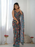 Dark blue georgette saree featuring digital print and mirror work