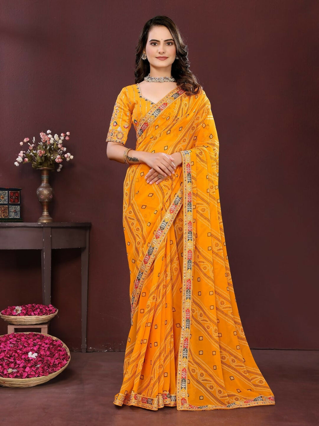 Bright yellow georgette saree with vibrant digital print