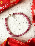 Onion pink glass bead bracelet for women on a neutral background