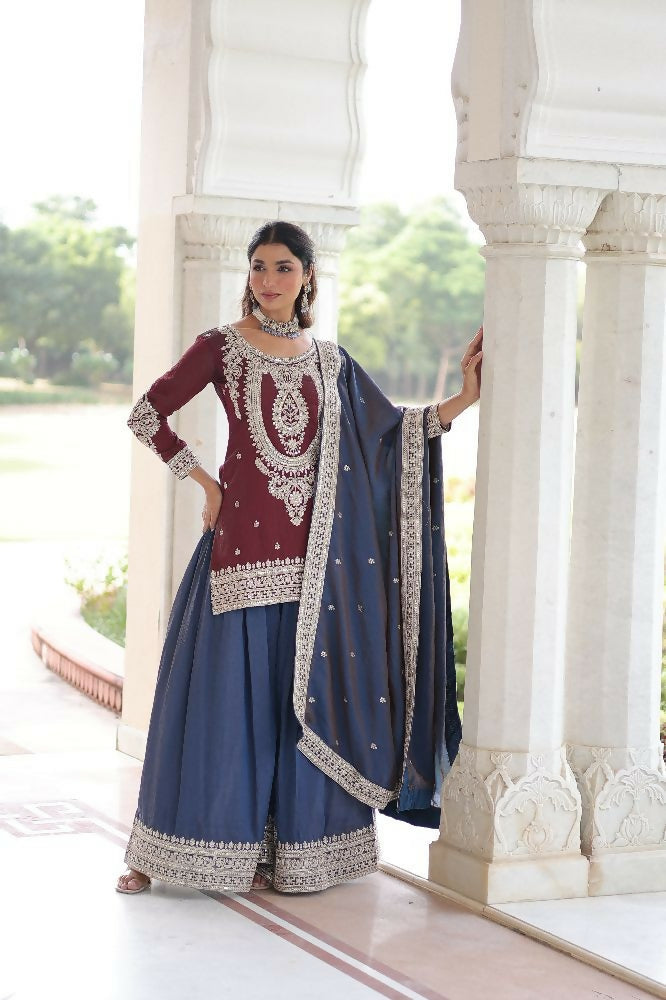 Maroon silk kurta set featuring elegant zari, sequins, and thread embroidery